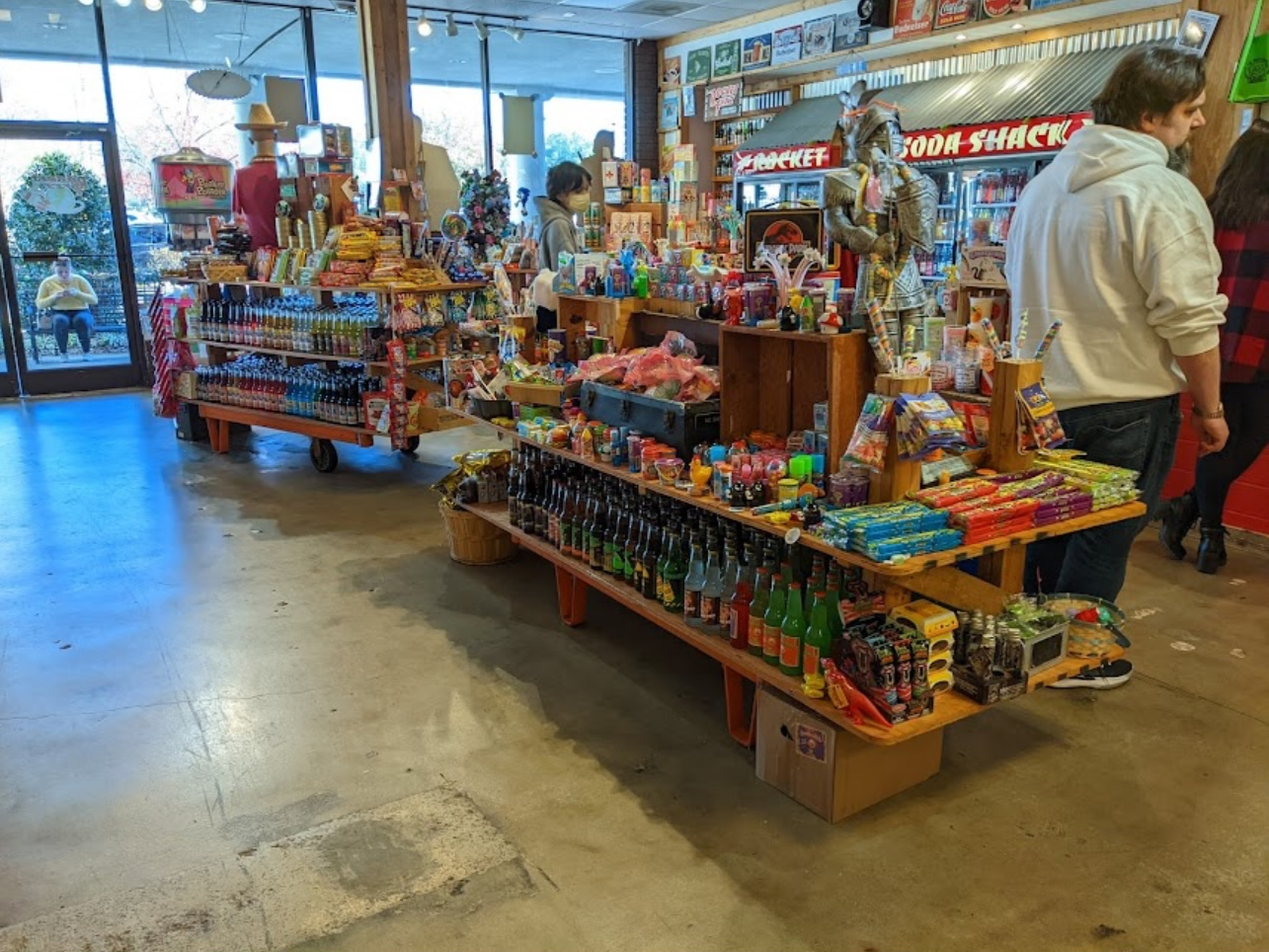 Candy store interior with items and checkout